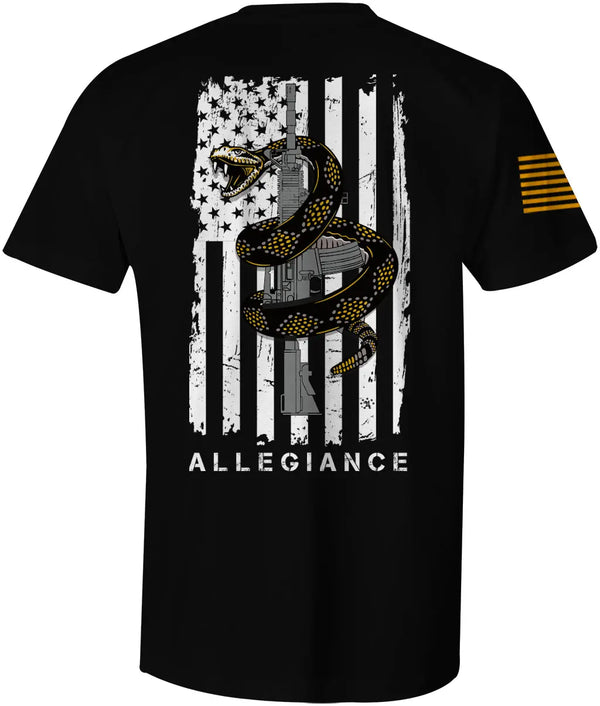 Back of Rattler Tee in black showcasing large rattlesnake wrapped around a rifle over a distressed American flag.